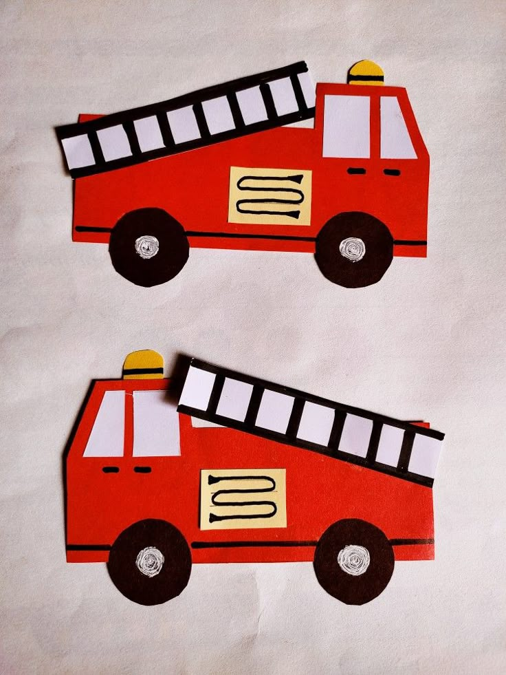 paper cut out of the shape of a fire truck