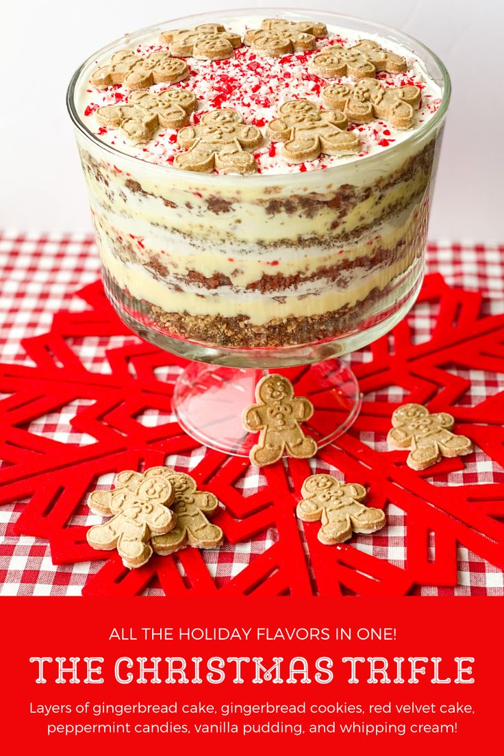 a christmas trifle cake on a red and white checkered tablecloth with gingerbread cookies