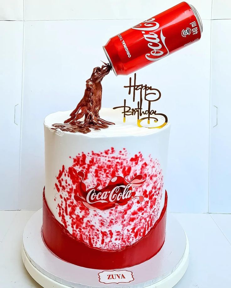 a coca - cola can being poured into a cake