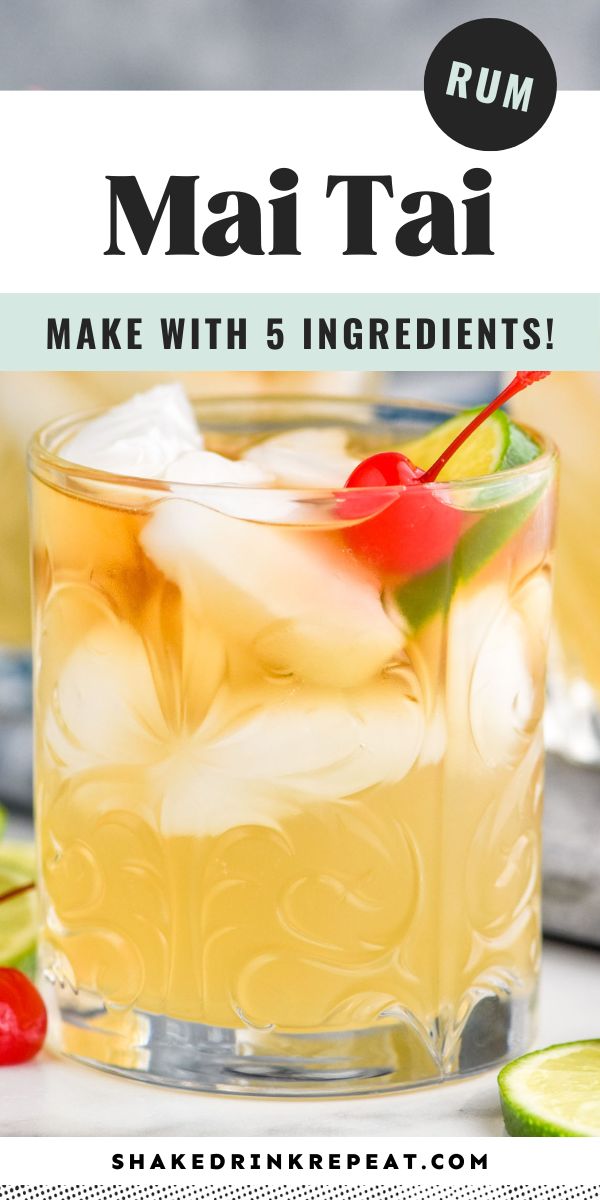 a close up of a drink in a glass on a table