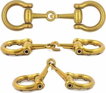 three pieces of gold colored metal chain with hooks and eyelets