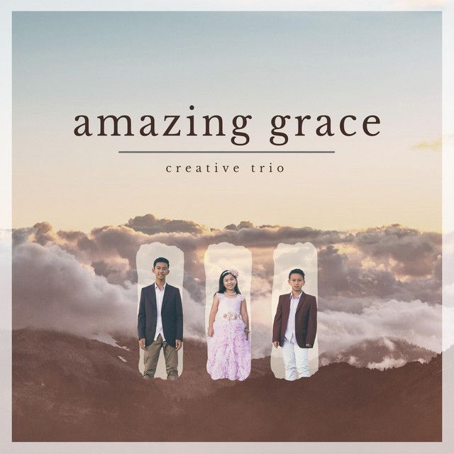 three people standing on top of a mountain with the words amazing grace in front of them