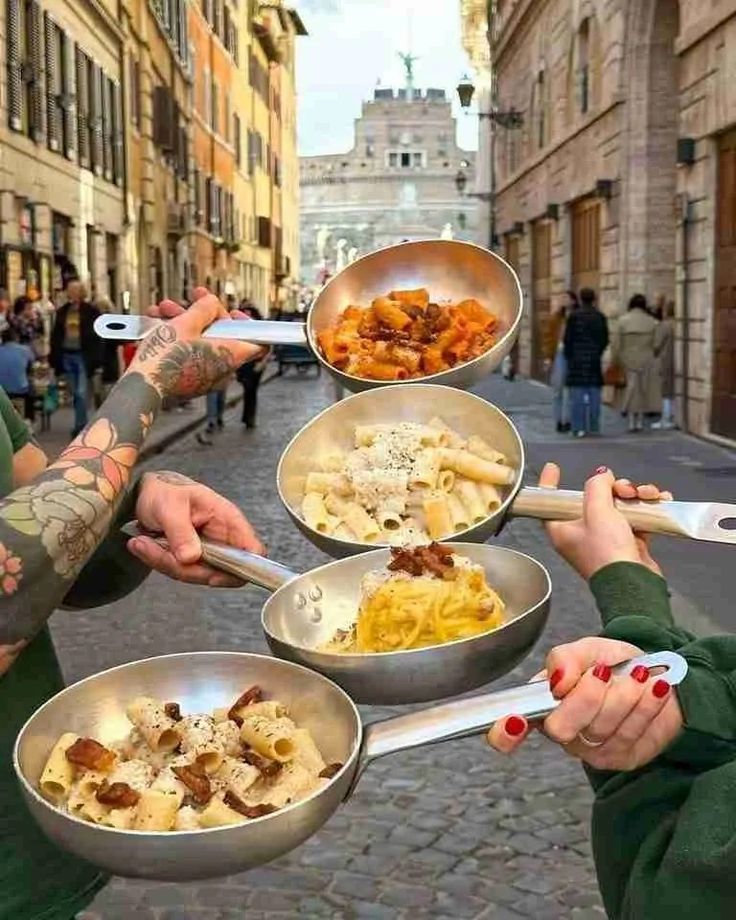 three people are holding bowls with food in them and one person has their hand on the bowl