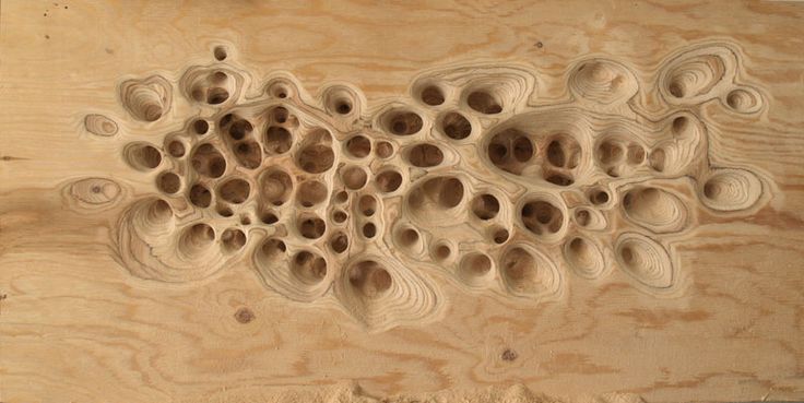 the wood is made to look like it has holes in it