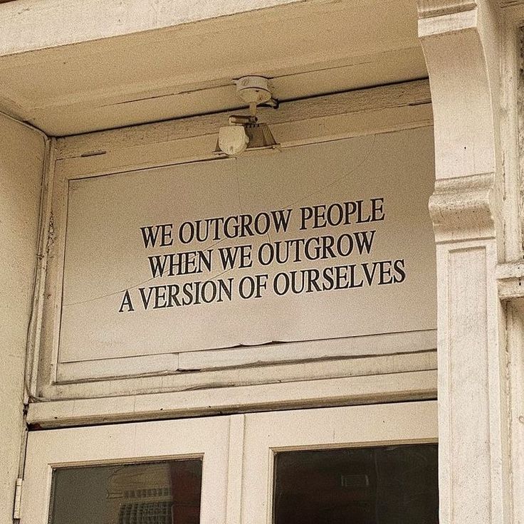 a sign that reads we outgrow people when we outgrow a version of ourselves