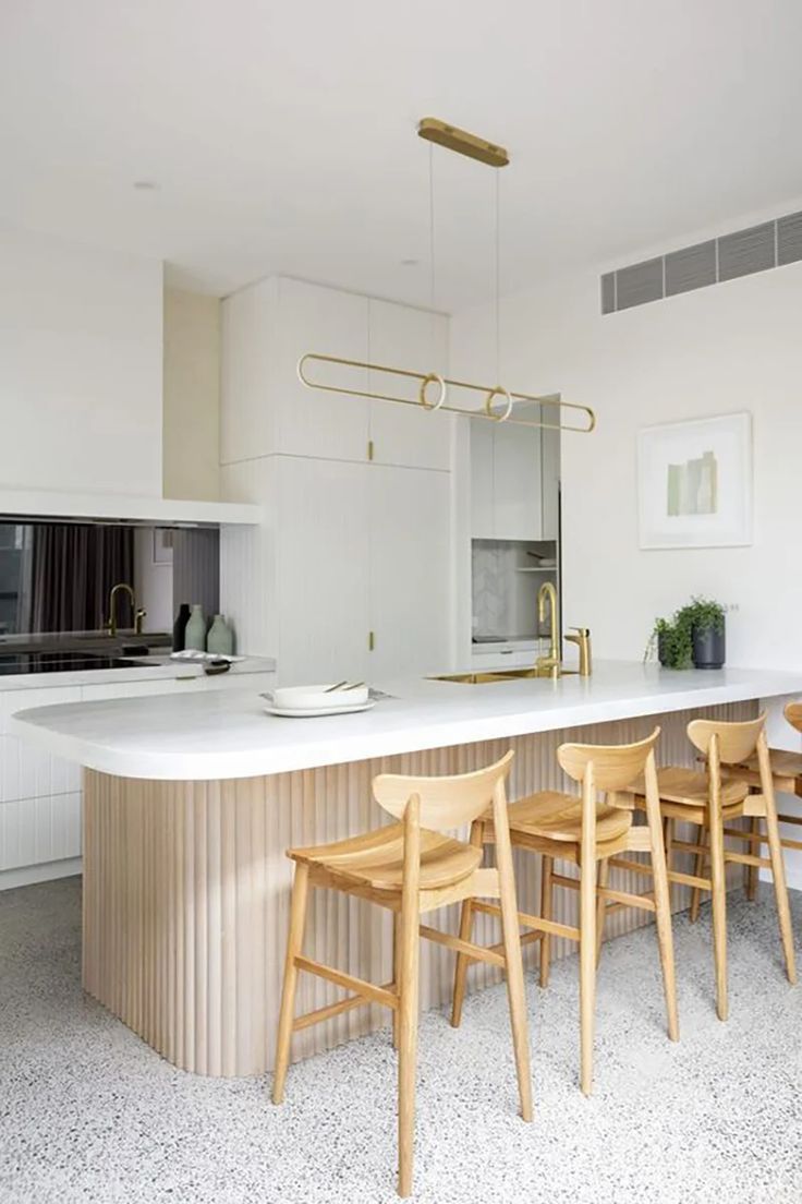 the kitchen is clean and ready to be used as a dining room or office space