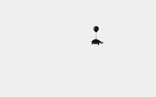 a black and white photo of an upside down balloon in the middle of the sky