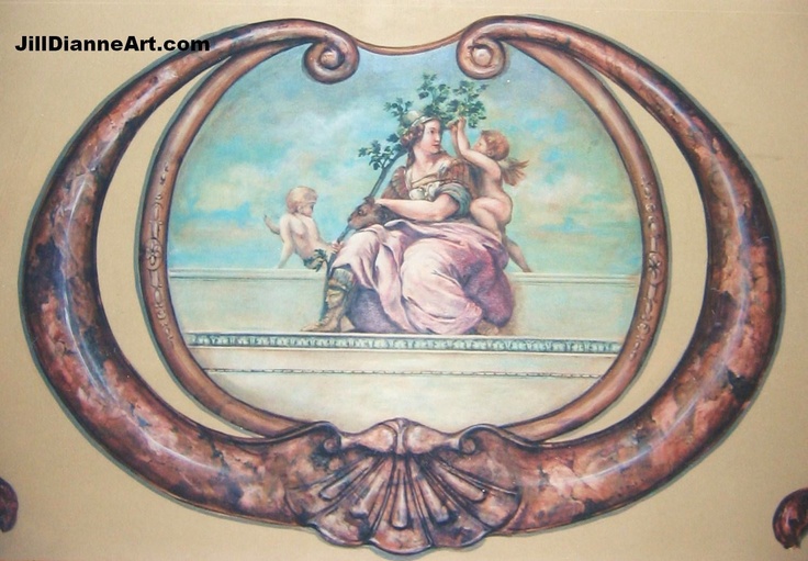 a painting on the side of a wall with an oval frame and two cherubs