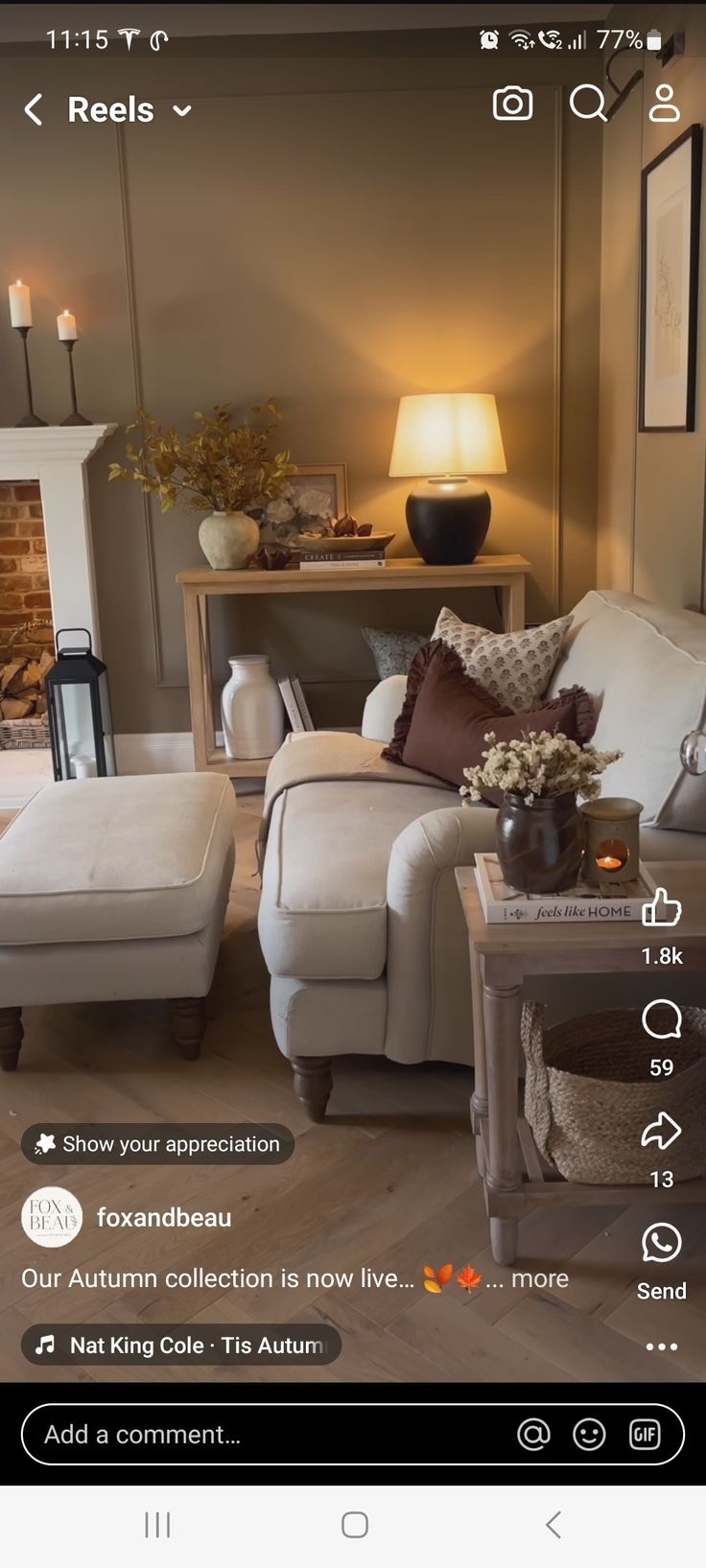 a living room filled with furniture and a fire place in front of a couch, coffee table