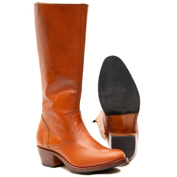 There's nothing like a real pair of Mimi Cowgirl Boots. The way they smell when you first get them, the smooth patina the worn leather shines, and best of all how only your foot fits in what seems to be the perfect fitting boot. Shaft Height: 13.20 in. Heel Height: 2.00 in. Leather Heeled Boots With Rubber Sole And Snip Toe, Fall Work Boots With Leather Lining And Snip Toe, Western Style Oiled Leather Boots With Goodyear Welt, Western Boots With Rubber Sole And Plain Toe, Western Boots With Rubber Sole, Fall Boots With Oiled Leather And Leather Sole, Western Boots With Oiled Leather And Leather Sole, Western Plain Toe Boots With Rubber Sole, Classic Round Toe Riding Heeled Boots