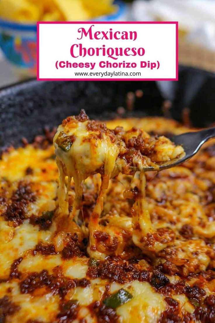 mexican chorizo cheesy cheese dip is being lifted from a skillet