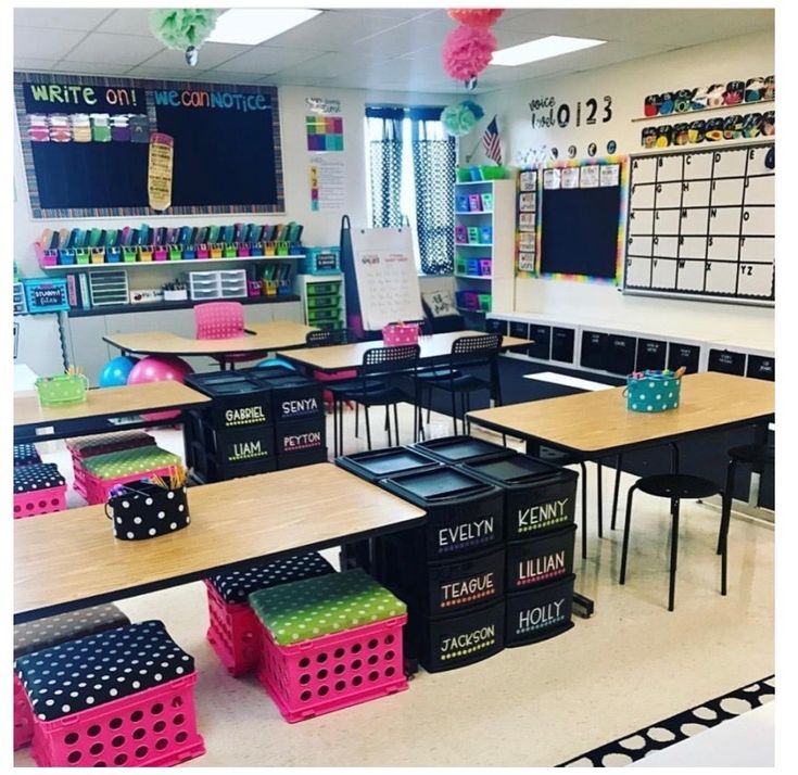 an empty classroom with desks, chairs and chalkboards on the bulletin board wall