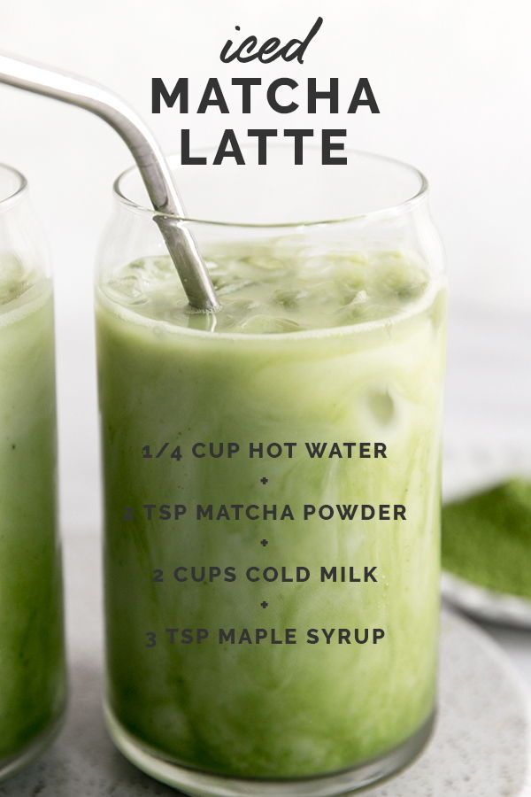 two glasses filled with matcha latte on top of a table