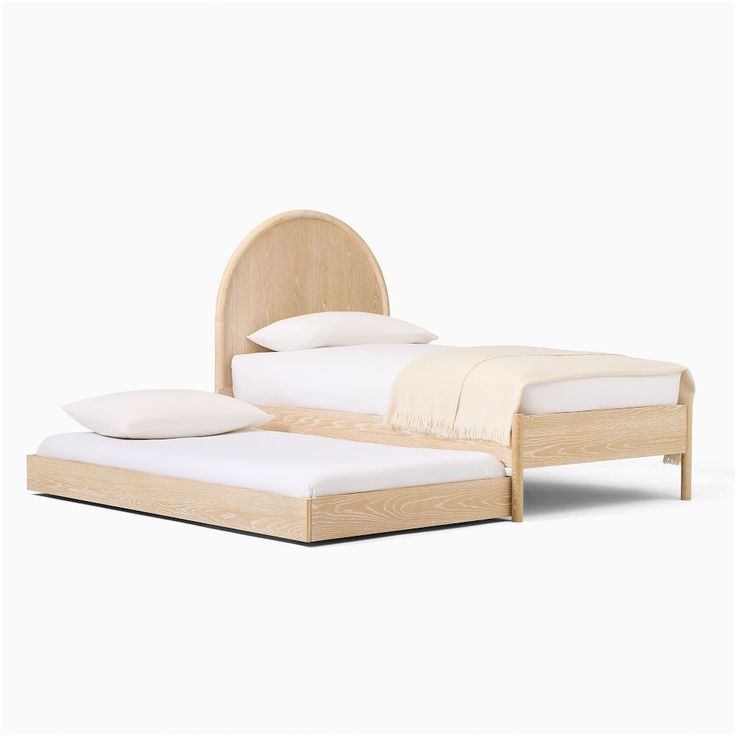 a bed with two pillows and a headboard made out of plywood, on a white background