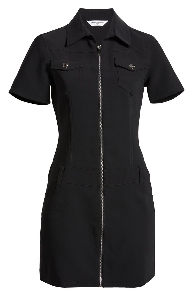 A sporty zip slices down the center of this polished collared mini framed by abbreviated sleeves. 33" length (size Medium) Front zip closure Spread collar Short sleeves Chest button-flap pockets; front scoop pockets Lined 100% polyester Dry clean Imported