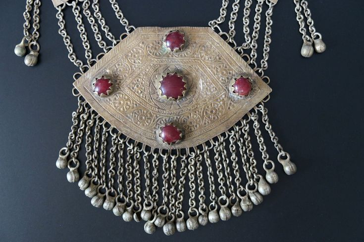 "This large traditional Lake Dal necklace was handcrafted during the early 1900's in the lush Kashmir Valley of Central Asia. It is very old tribal-jewelry, not a new reproduction. MEASUREMENTS (1 inch = 2.54 cm): Necklace Length = 32 inches Pendant = 5 inches long x 4.5 inches wide Weight = 7.4 oz Shipping Weight = 12 oz Image library 12-28-2022 Necklaces like this were traditionally worn in the region of Kashmir's romantic Dal Lake - especially at weddings. Prized by their owners, they were pa Traditional One-of-a-kind Necklace For Festival, Vintage Necklace With Large Pendant For Festivals, Vintage Necklaces With Large Pendant For Festivals, Traditional One-of-a-kind Necklaces For Ceremonial Occasions, Traditional Medallion Jewelry For Ceremonial Occasions, Traditional One Of A Kind Necklaces For Ceremonial Occasions, Traditional Ceremonial Necklaces, Artisan Necklace For Ceremonial Occasions, Antique Heavy Necklaces For Festival