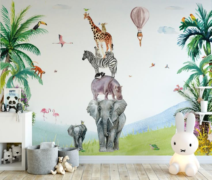 an elephant, giraffes, zebra and other animals are depicted in this children's room wall mural