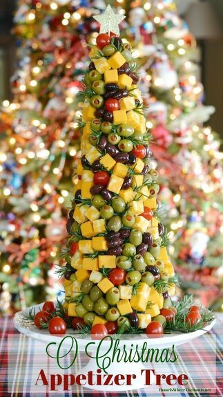 a christmas tree made out of olives and cheese on a plate with the words make a edible christmas tree centerpiece