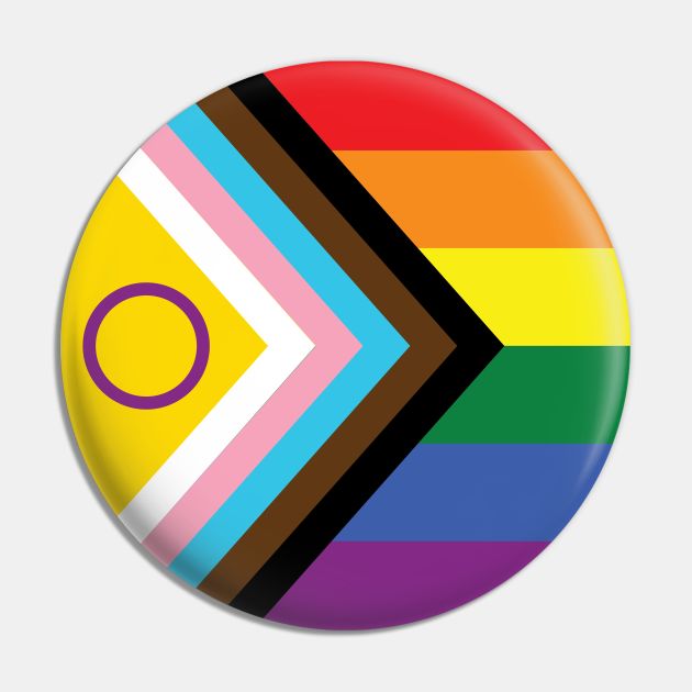 a colorful button with an arrow on it