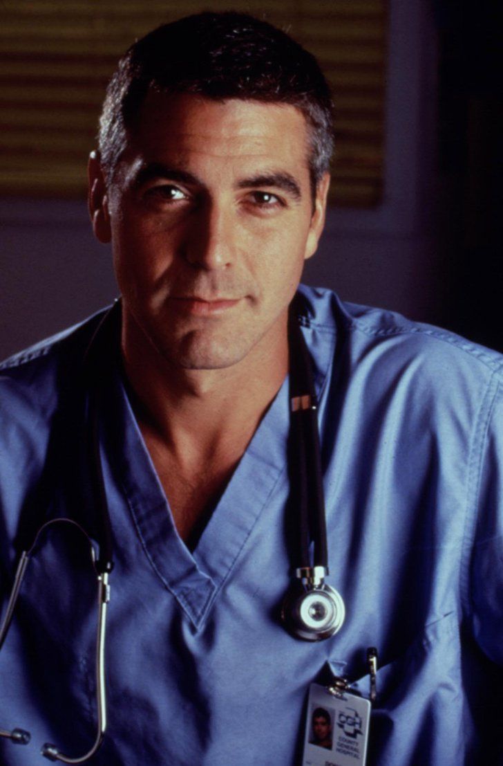 a man with a stethoscope on his neck is looking at the camera