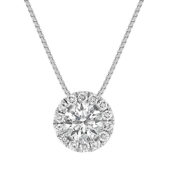 Fourteen sparkling round pavé-set diamonds  at approximately .35 carat total weight  serve as the perfect backdrop to the center stone of your choice at approximately .84 carat in this dazzling 14 karat white gold halo pendant. The design hangs from an 18-inch matching box chain. For more information on selecting your center stone  Live Chat or call an online customer service representative at 1-866-467-4263  or visit one of our store locations. Luxury Diamond Halo Necklace, Luxury Halo Design Diamond Necklace As Gift, Luxury Halo Engagement Necklace, Luxury Platinum Diamond Necklace With Halo Setting, Diamond White Necklace With Halo Setting And Round Stone, White Diamond Necklace With Round Cut Halo Design, Diamond Necklace With Halo Setting And Round Stone, Sterling Silver Diamond White Necklace With Halo Design, Dazzling Solitaire Necklace With Round Pendant And Halo Setting