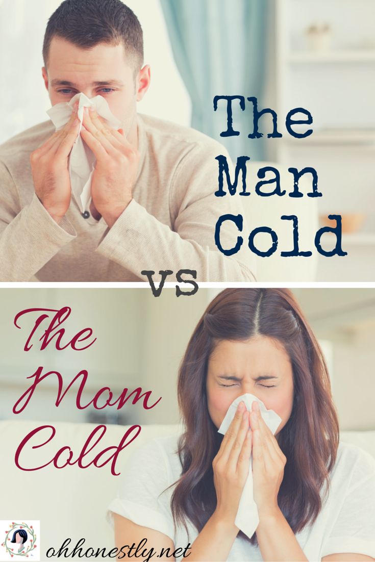 the man is blowing his nose next to the woman who is sneezing her nose