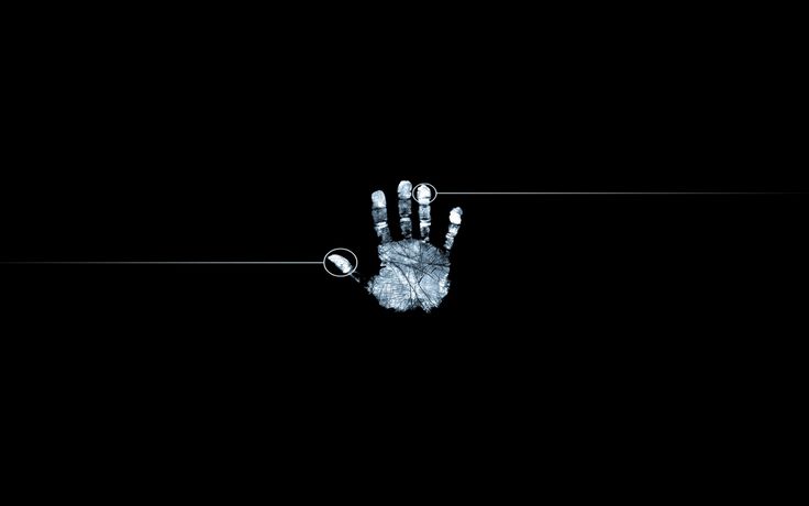 an image of a hand that is in the dark