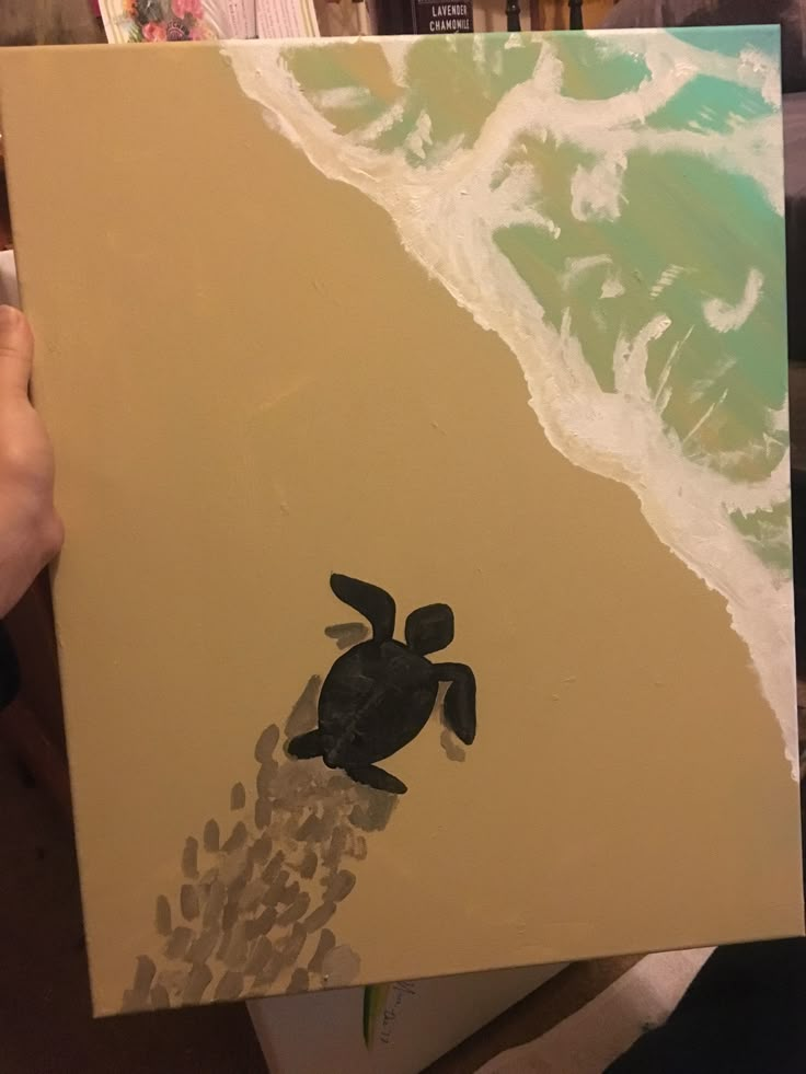 a painting of a turtle coming out of the ocean