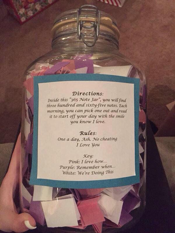 a jar filled with lots of confetti on top of a table next to a note