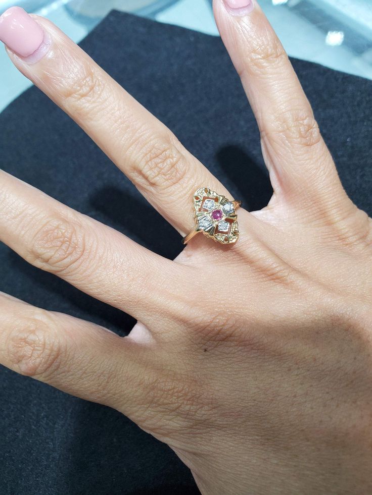 ♥ Product Summary ♥Main Stone: Ruby & DiamondsBand Material: 14k Yellow GoldStone Cut: RoundSize: 6.5Size can be adjusted – one size up/down is $35 two sizes up/down is $45. Once ring is adjusted it is final sale. Classic Morganite Jewelry With Prong Setting, Fine Jewelry 14k Gold Cluster Promise Ring, 14k Gold Emerald-cut Birthstone Ring With Diamond Cut, 14k Gold Halo Ring With Prong Setting, 14k Gold Birthstone Ring With Emerald Cut Diamond, 14k Gold Emerald Cut Diamond Birthstone Ring, 14k Gold Cluster Ring For Promise Occasions, Fine Jewelry 14k Gold Cluster Ring For Promise, 14k Yellow Gold Cluster Ring With Oval Shape