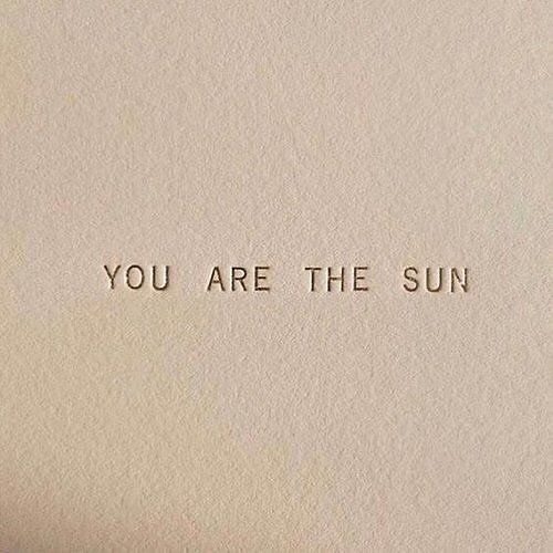 an old typewriter with the words you are the sun printed on it's paper