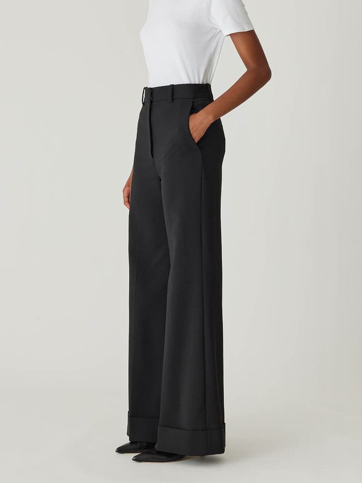 Featuring a high waist, sophisticated wide-leg silhouette, and chic cuff details, these trousers offer a polished and elegant look. High waist Wide-leg silhouette Chic cuff details 41% Wool, 52% Polyester, 4% Elastane, 3% Polyamide Dry Clean Only Black Wide Leg Trousers, Elegant Look, Cuff Detail, Rebecca Taylor, Casual Pants, Work Wear, High Waist, Wide Leg, Trousers