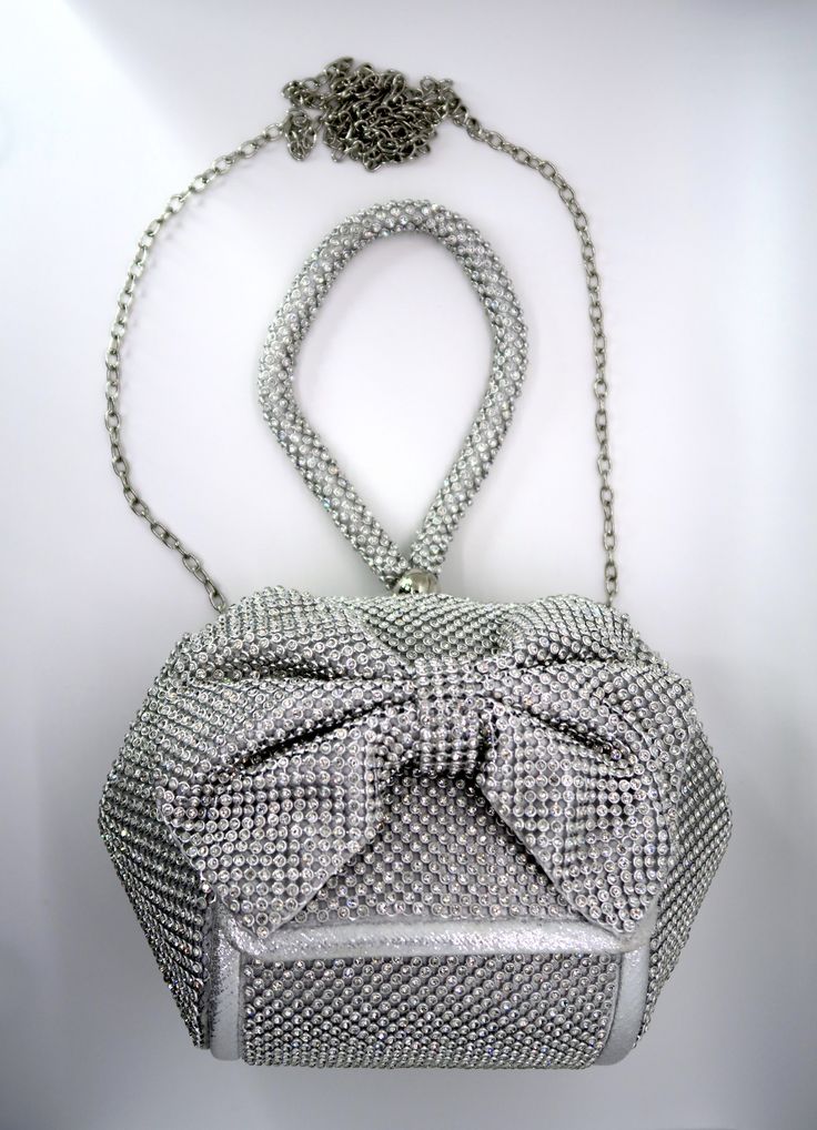 This event bag can easily be interchange into a handbag or a chained, over the shoulder bag. This item comes in both rose gold or silver. Over The Shoulder Bag, Over The Shoulder Bags, Party Purse, Arm Candy, House Decor, Silver Gold, Jewelry Accessories, Dream House, Bag Lady