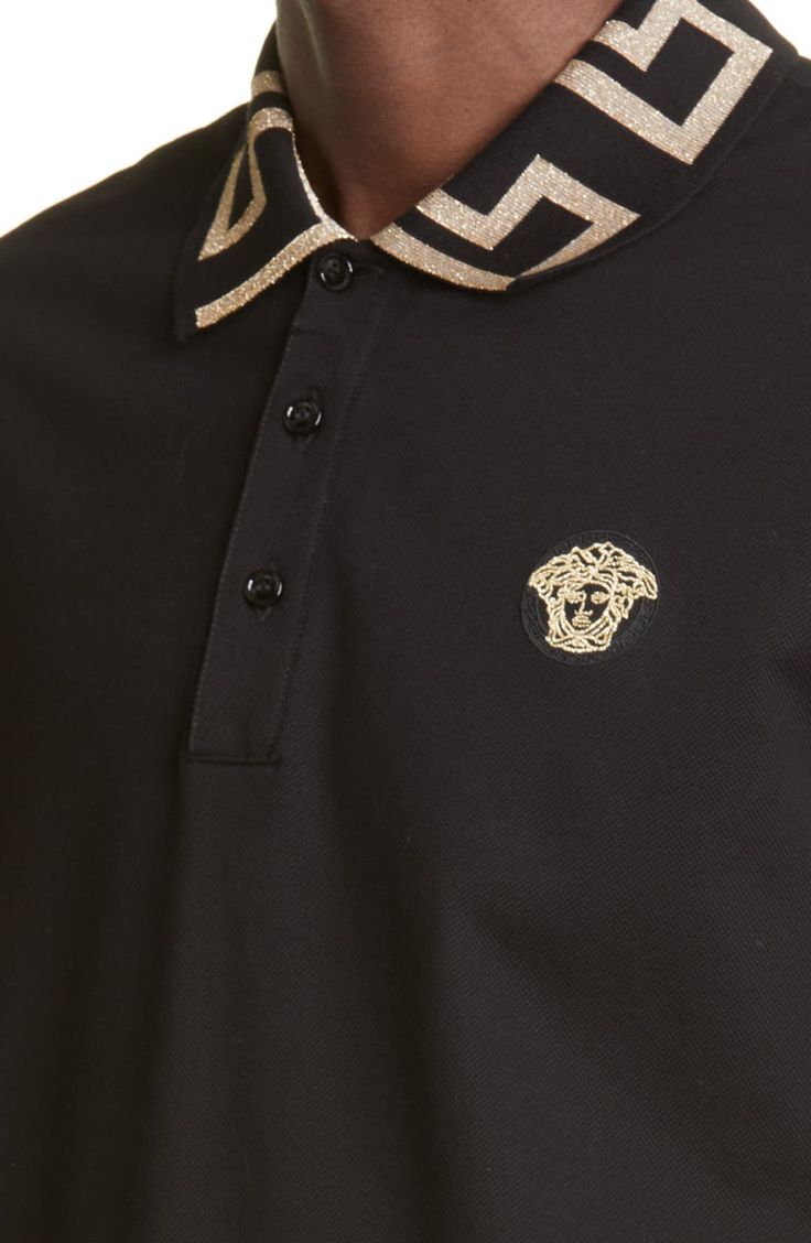 The brand's Greek key pattern glitters and glistens at the jacquard-woven collar on this cotton-piqué polo with a signature Medusa head at the chest. 28 1/2" length (size Medium) Button half-placket Spread collar Short sleeves 100% cotton Machine wash, dry flat Made in Italy Men's Designer Clothing Designer Top With Embroidered Logo And Collared Neckline, Designer Tops With Embroidered Logo, Luxury Polo Shirt With Collared Neckline For Work, Luxury Collared Polo Shirt For Workwear, Luxury Polo Shirt With Ribbed Collar For Work, Designer Collared Polo Shirt For Formal Occasions, Luxury Collared Polo Shirt For Formal Occasions, Luxury Cotton Polo Shirt For Formal Occasions, Luxury Formal Polo Shirt With Collared Neckline