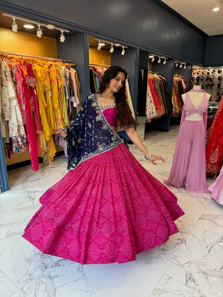 Ready to Ship! Rani Pink bandhani Chaniya choli Blouse crafted with sleeves with a paan neckline with mirror and pearl handwork and unique hemline Paired with beautiful vintage blue dupatta. WASH CARE INSTRUCTION: Dry clean only. Slight variation in color is possible due to digital photography. Shipping will take 5 business days, Please WHATSAPP +1 (945) 444-2194 for more info and further customizations Crop Top Suit, Sharara Suits, Choli Blouse, Chaniya Choli, Long Gown, Salwar Suits, British Indian, Digital Photography, Kids Wear