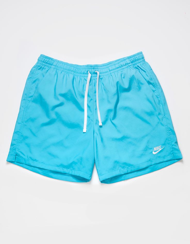 Nike Essentials Flow Nylon Shorts. Elastic Drawstring Waist. Nike Logo Embroidered At Hem. Slant Hand Pockets. Back Patch Pocket. Mesh Lined Interior. Approx. Inseam: 5.5''. 100% Polyester. Machine Wash. Imported. Nike Beachwear Shorts For Swimming, Casual Nike Bottoms For Poolside, Nike Blue Nylon Bottoms, Nike Sporty Swimwear For Summer, Nike Short Swimwear For Sports, Nike Sports Swimwear Shorts, Nike Casual Nylon Shorts, Casual Nike Nylon Shorts, Nike Nylon Bottoms With Elastic Waistband