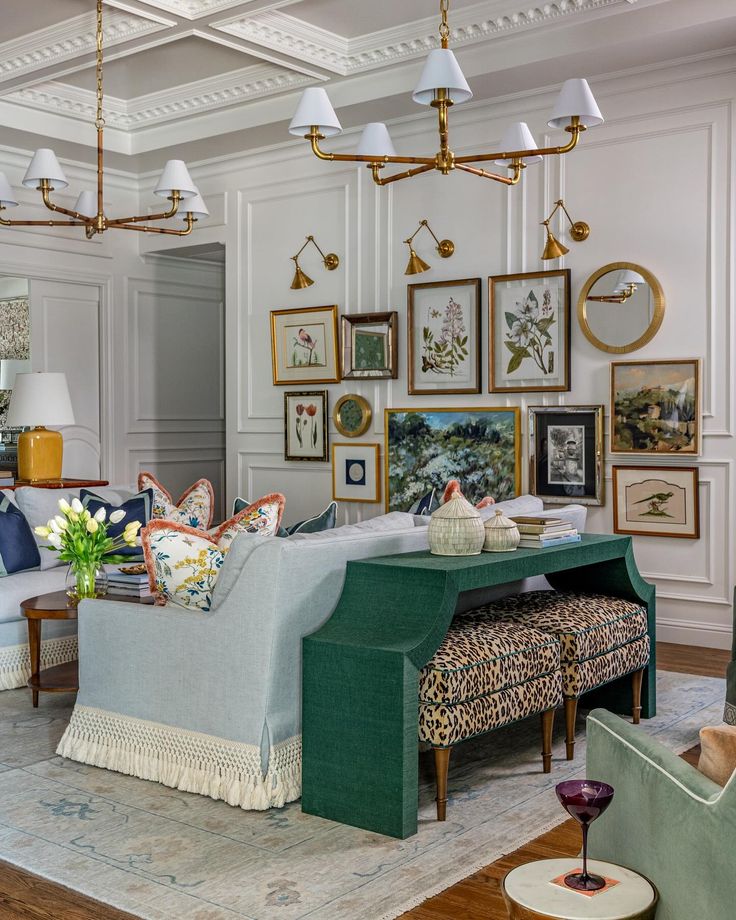 a living room filled with lots of furniture and pictures on the wall next to each other