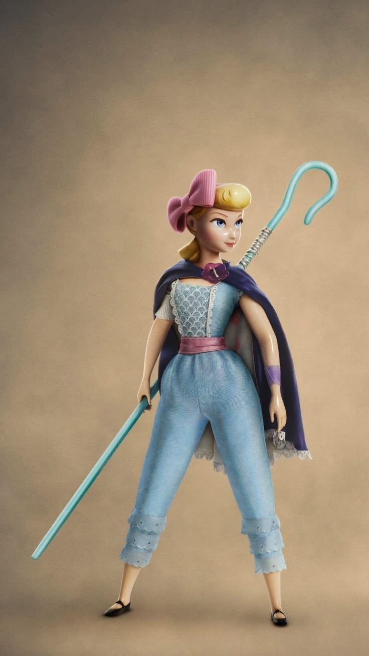 an action figure is posed with a wand