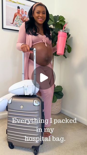 a pregnant woman standing next to her suitcase with the words everything i packed in my hospital bag