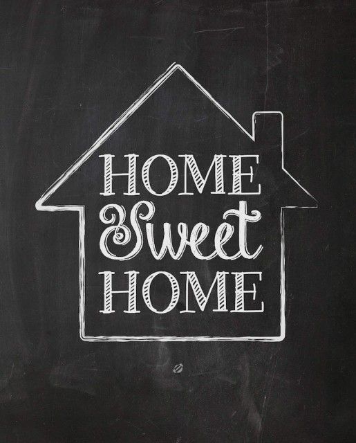 the words home sweet home written in chalk on a blackboard with a white house