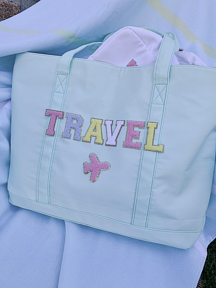 High quality nylon beach bag with zipper. Perfect for beach, gym, travel and gifts. Choose your own letter patches to add the personal touch. For SPF clear bags, please check out this link: https://etsy.me/38xAnnCFor XL make up pouch, please check out this link: https://etsy.me/3M2XkwySize: 21 inch x 13.5 inch x 5 inch Customizable Travel Tote Bags, Personalized Green Travel Bag, White Travel Bag With Embroidered Logo, Rectangular Travel Bag With Letter Embroidery, Trendy White Travel Bag, Personalized Tote Bags For Travel, Trendy Letter Print Beach Bag For Travel, White Letter Print Beach Bag For Travel, White Beach Bag With Letter Print For Travel