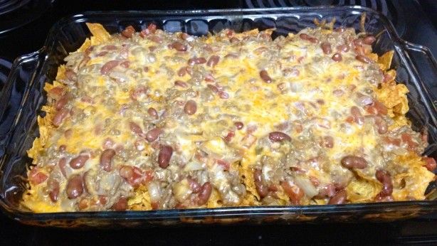 a casserole dish is sitting on the stove top, ready to be eaten