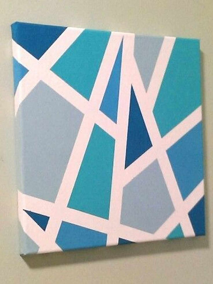 a blue and white painting on the wall