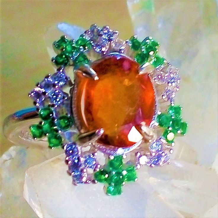 natural spessartine and green and white cz 925 silver sterling ring Orange Multi-stone Fine Jewelry Rings, Multi-stone Cubic Zirconia Jewelry For May Birthstone, Oval Tsavorite Jewelry With Accent Stones, Fine Jewelry With Orange Center Stone, Fine Jewelry Orange Center Stone, Multi-stone Citrine Fine Jewelry, Fine Jewelry Citrine Multi-stone, Orange Multi-stone Ring, Fine Jewelry With Orange Cubic Zirconia