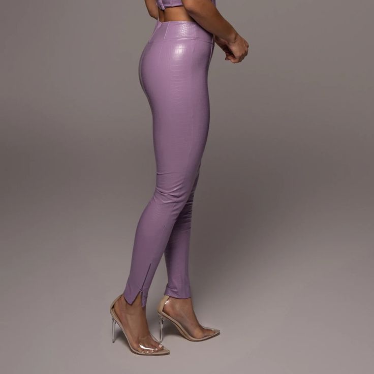 Materials: 100% Pu 88% Polyester 12% Spandex Product Origin: Imported Washing Instructions: Dry Clean Only Model Is Wearing Size S Trendy High-cut Leg Pants With High Stretch, Trendy High Stretch Pants With High-cut Leg, Trendy High-cut Leg Fitted Pants, Trendy High-cut Leg Tight Pants, High Waist Purple Bottoms For Night Out, Trendy Tight Pants With High-cut Leg, Trendy Fitted Pants With High-cut Leg, Trendy Purple Pants For Night Out, Purple Elastane Bottoms For Spring