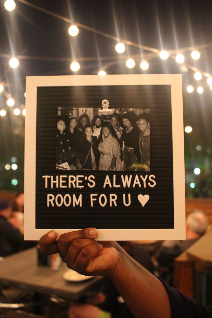 a person holding up a sign that says there's always room for u