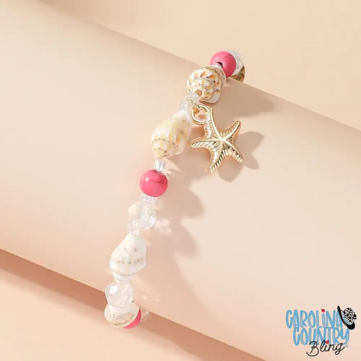 Embrace the thrill of the unknown with The Ocean Calls Me bracelet in pink. This beach-inspired design features delicate pink beads and sea shells, perfect for those who love taking risks and seeking new adventures! Dare to stand out and conquer the waves. Measures 8" Sold as one individual bracelet. Bohemian Pink Beaded Bracelets For Vacation, Pink Jewelry For Beach Party, Bohemian Pink Jewelry For Beach Party, Pink Jewelry For Beach Party Season, Pink Bohemian Beaded Strand Bracelets, Pink Bracelet Jewelry For Vacation, Pink Bohemian Strand Beaded Bracelets, Pink Bohemian Beaded Strand Bracelet, Bohemian Pink Beaded Strand Bracelet