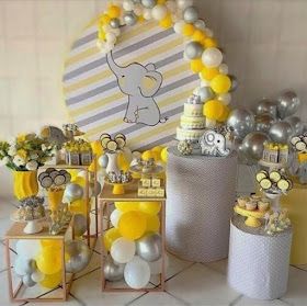 an elephant themed birthday party with balloons and decorations