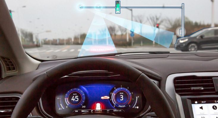 the dashboard of a car with an image of a speedometer on it's display