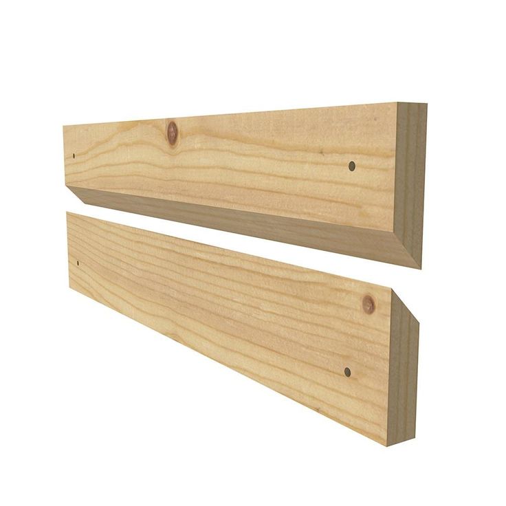 two pieces of wood sitting on top of each other in front of a white background